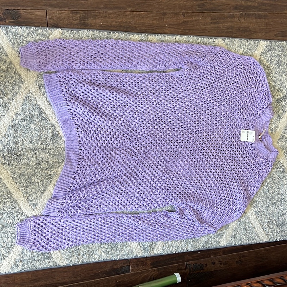 Free people crochet sweater in lavender.